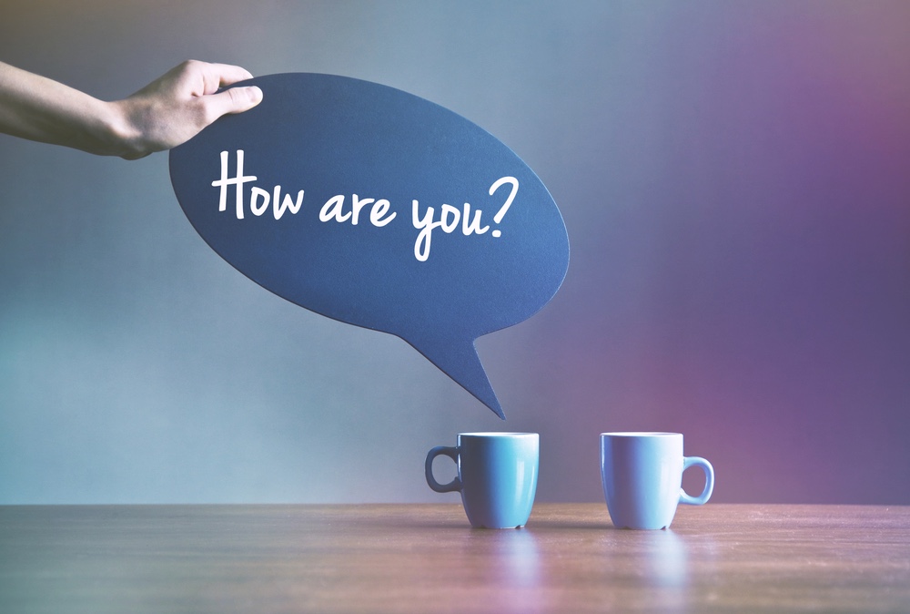 How are you? Coffee cups on table