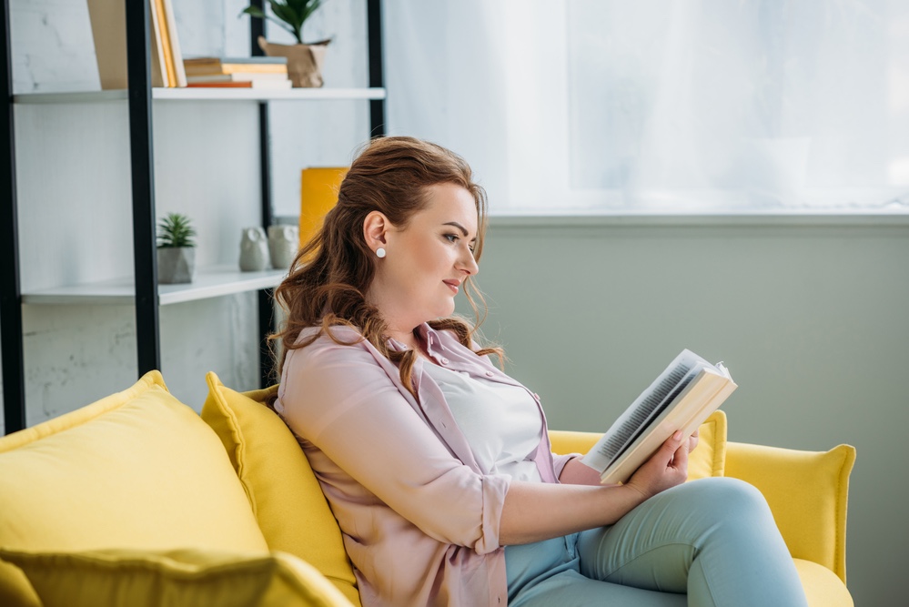 Woman relaxing reading a book