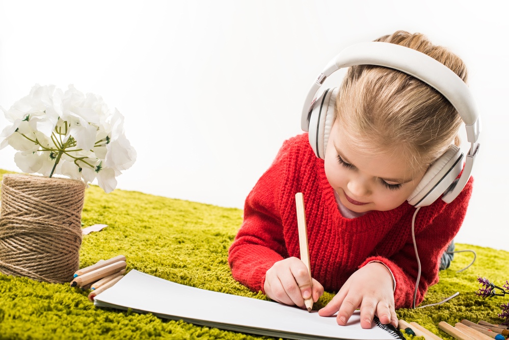 Little Girl Listening to Headphones