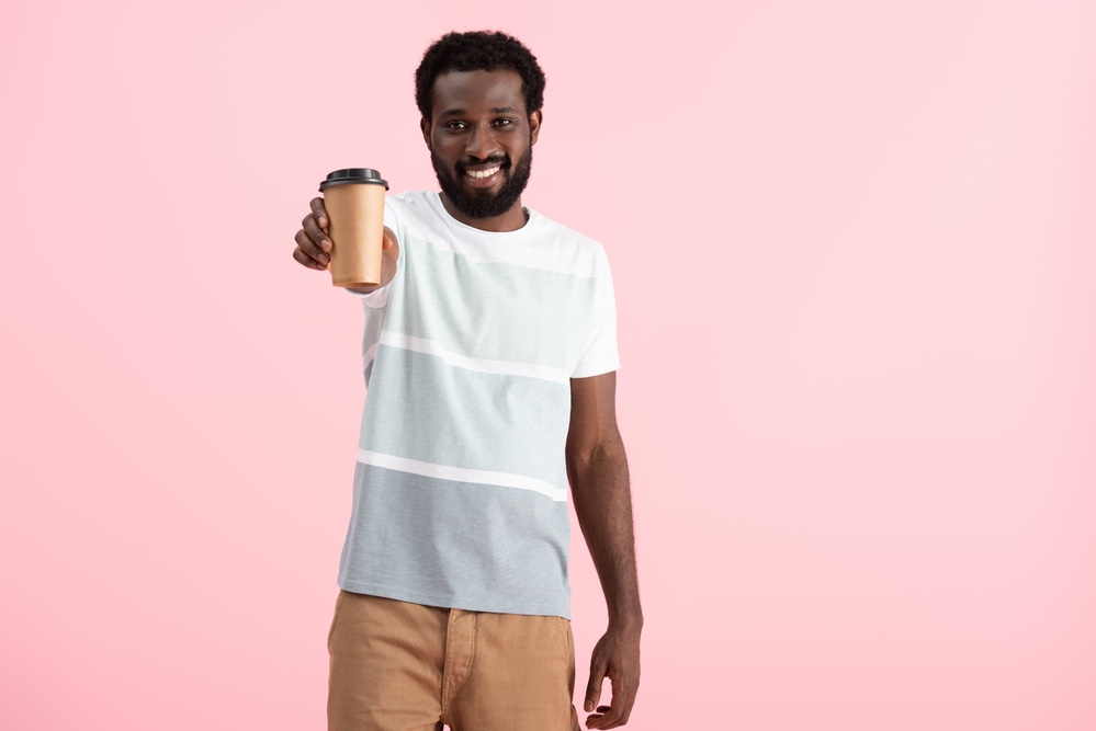 Smiling black man with coffee