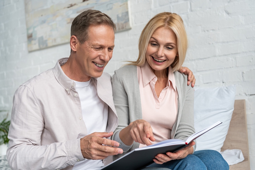 Couple enjoying reading book together